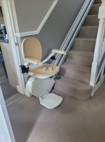 Stairlift on a carpeted staircase